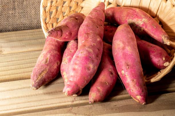 Sweet potato in basket on jute background in Brazil